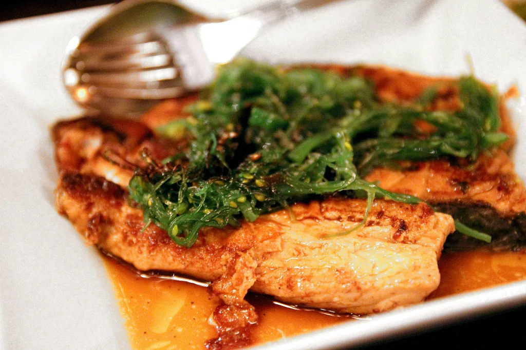 Fried salmon in an oyster and soy sauce Fried salmon in an oyster and soy sauce
