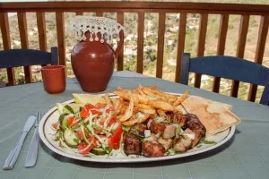 a grand portion of mouth-watering souvlaki at To Palio Cinema