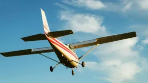 Light aircraft crashes in Greater Manchester; parachute reported caught on pylon