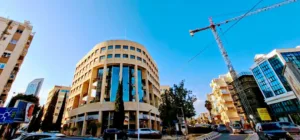 Cyprus and Greek business federations sign cooperation pact as unions warn on tourism and unemployment falls