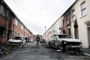 Belfast attack victim’s family urges calm after anti-immigrant violence erupts overnight