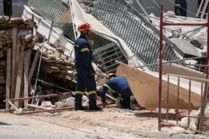 Athens rescuers search rubble after apartment block collapse in Petralona