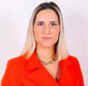 Diana Constantinides vows action on violence against women, recounts mother’s 1993 murder