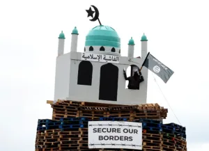 Northern Irish police arrest man over replica mosque placed atop bonfire in Moygashel