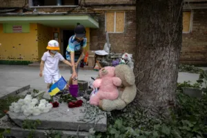 Kyiv mourns victims as rescuers search rubble after deadliest attack on city this year