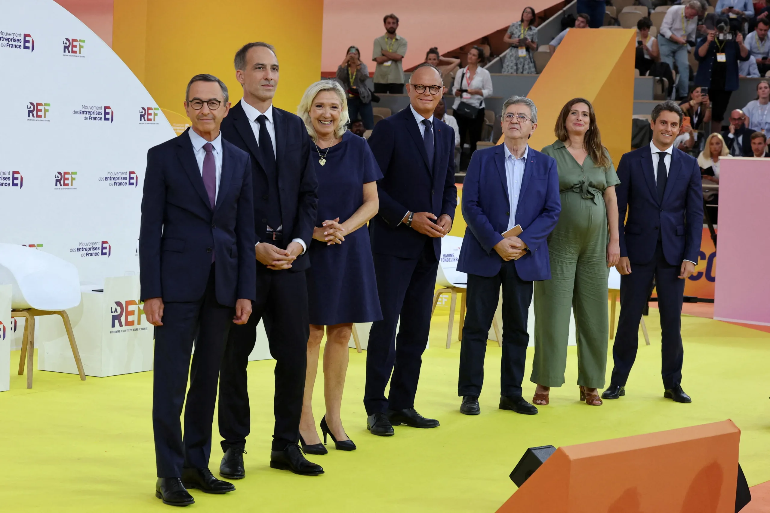 Le Pen pledges spending cuts in debate with French business leaders