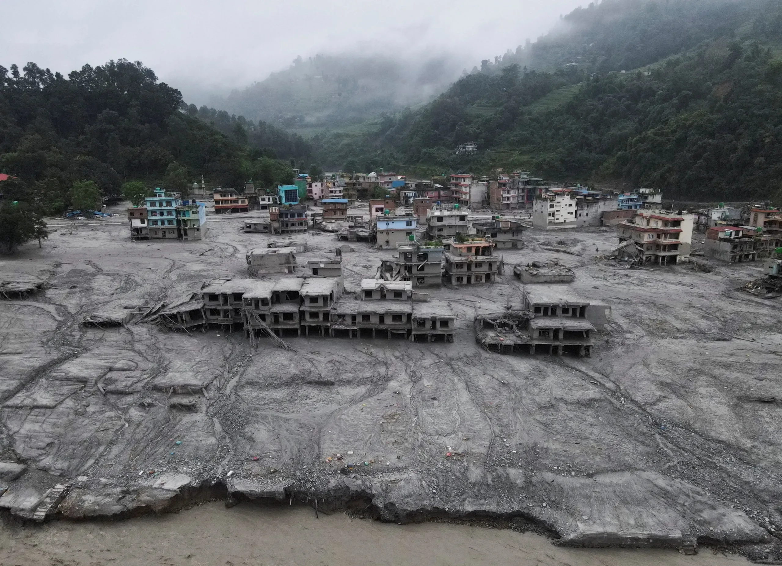 Nepal halts flood rescue efforts as weather worsens and thousands remain missing