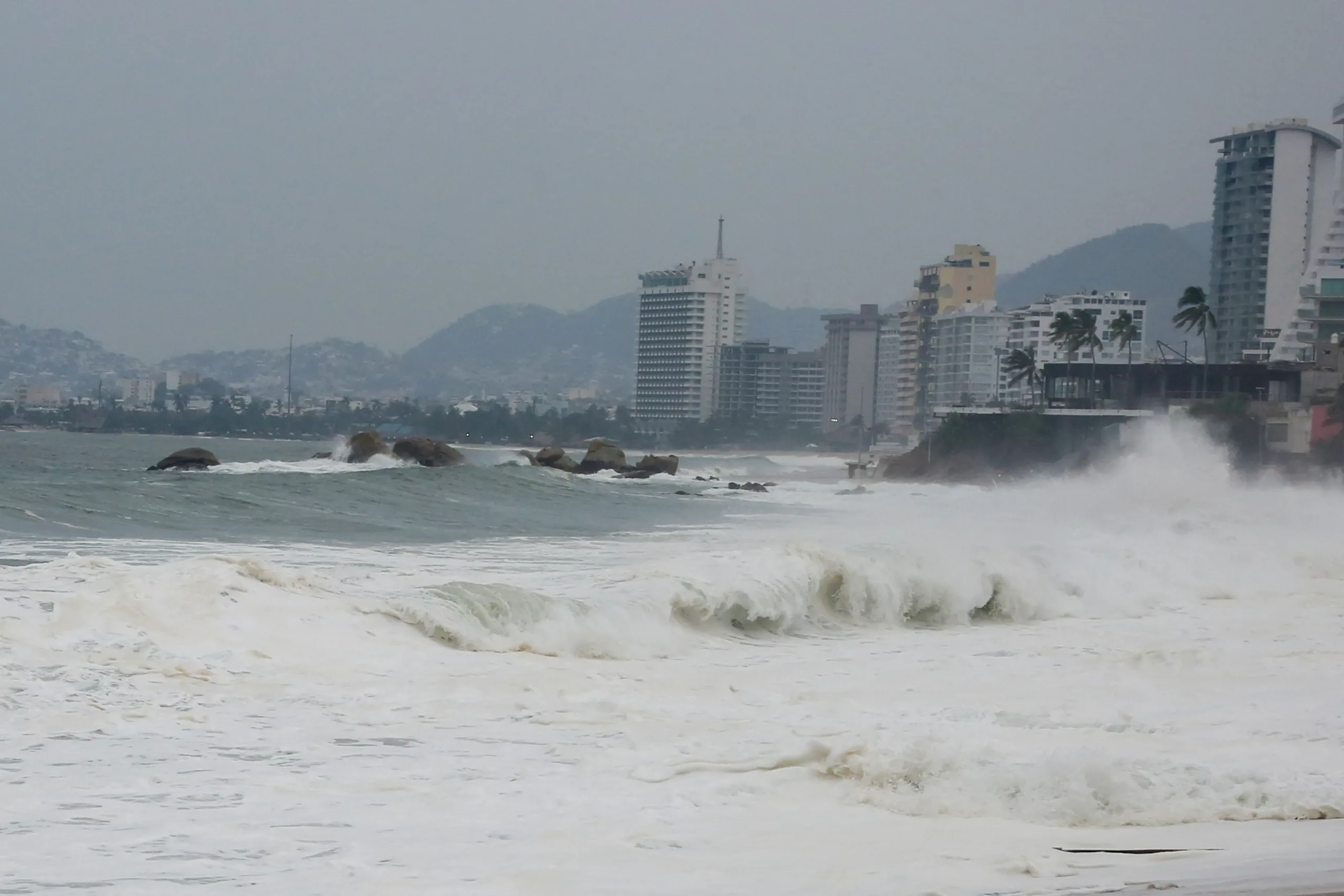 Hurricane Polo brings heavy rain and dangerous surf to southwestern Mexico