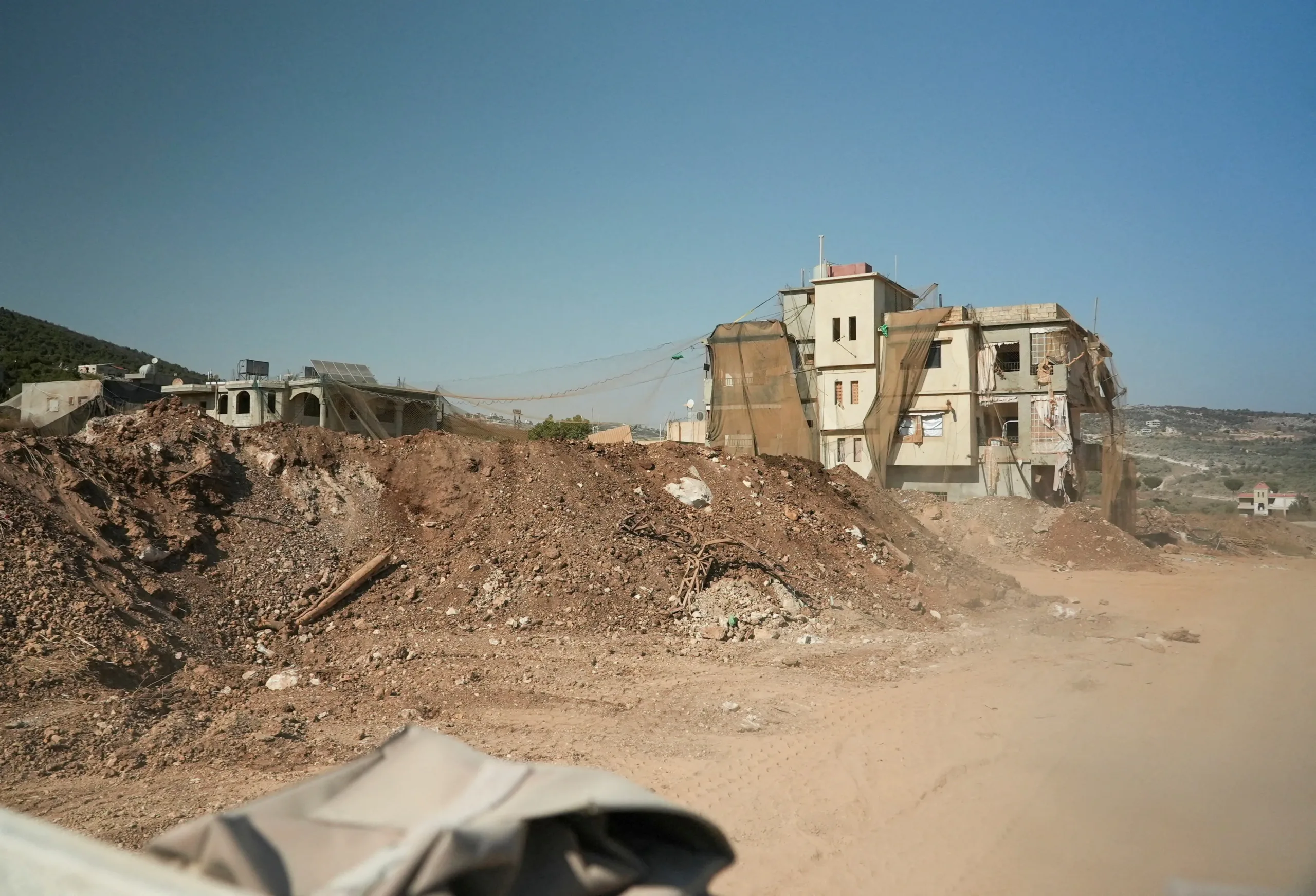 Israeli strikes on Kfar Rumman kill at least 13, including six children
