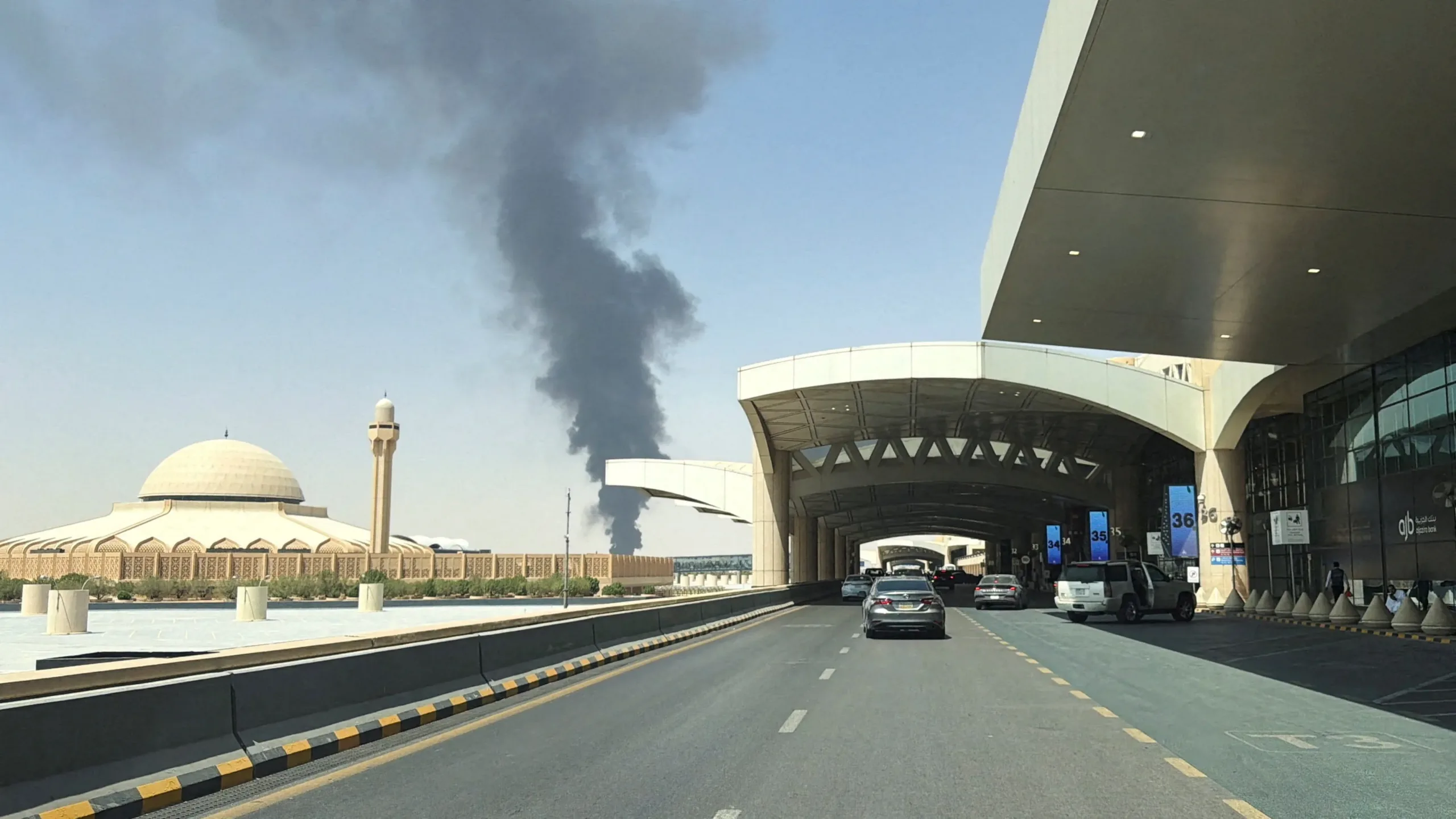 Smoke rises near Riyadh airport after booms and aerial attack alerts