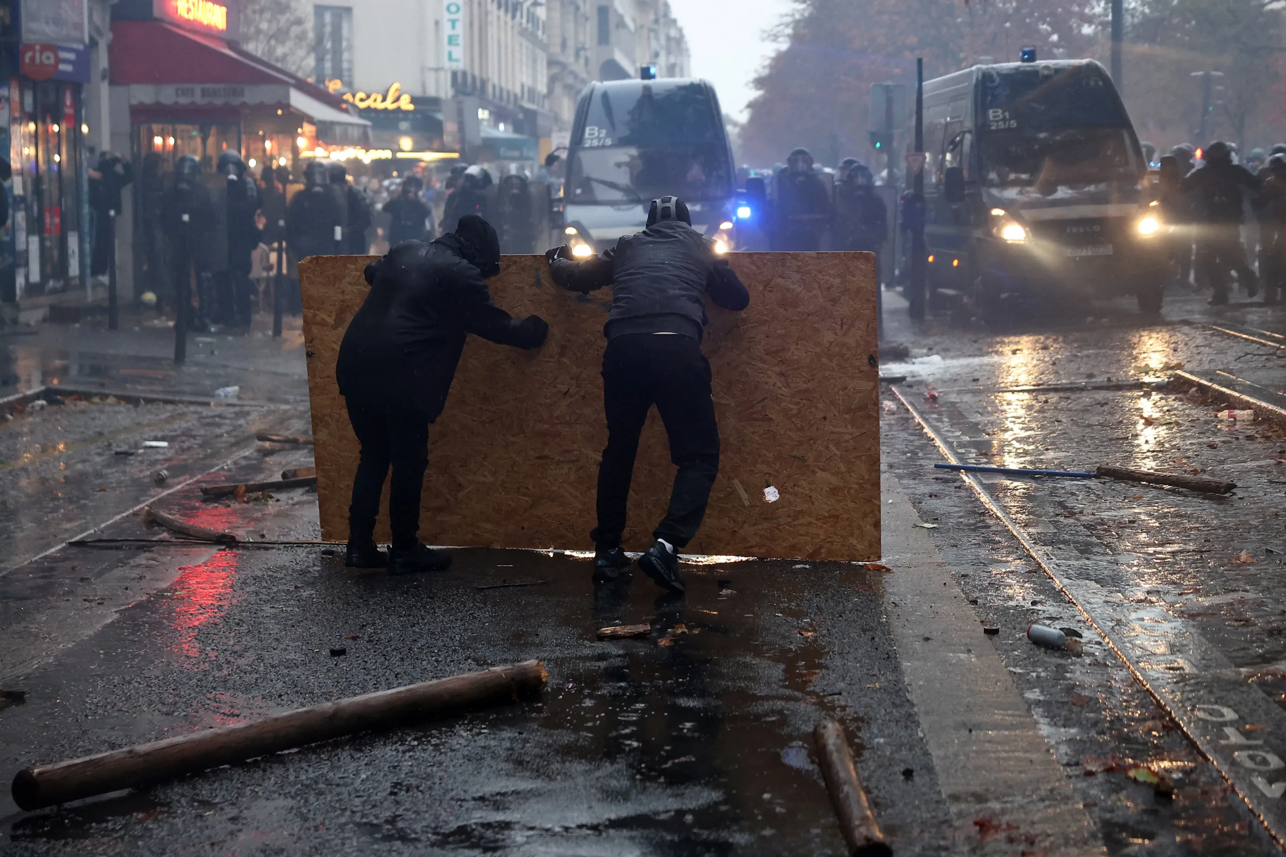 Clashes follow mass protests across France despite expanded security deployment